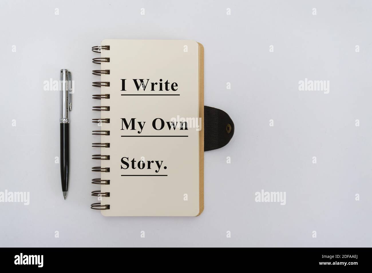 Overhead View of Notebook with Motivational Quote and Pen on White ...