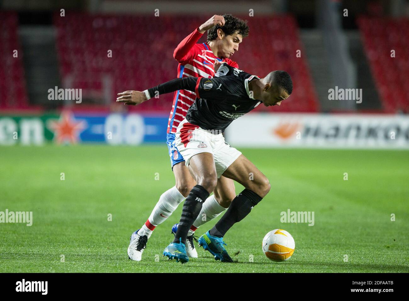 Jesus Vallejo of Granada and Cody Gakpo of PSV during the UEFA Europa League, Group E football match between Granada CF and  / LM Stock Photo