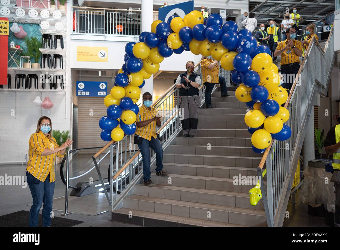 Employees of Ikea greet the clients arriving in the store. The Ikea store  of Paris Nord reopens after the ease of the lockdown due to Coronavirus  Covid19. Paris, France, 25 May, 2020.