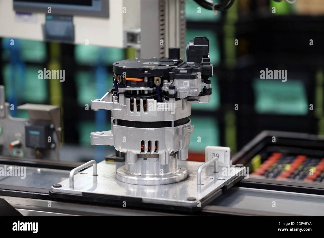 48 volts motors assembly line at the factory of manufacturer Valeo in  Etaples, near Le Touquet, northern France on May 26, 2020 during a visit of  French President as part of the