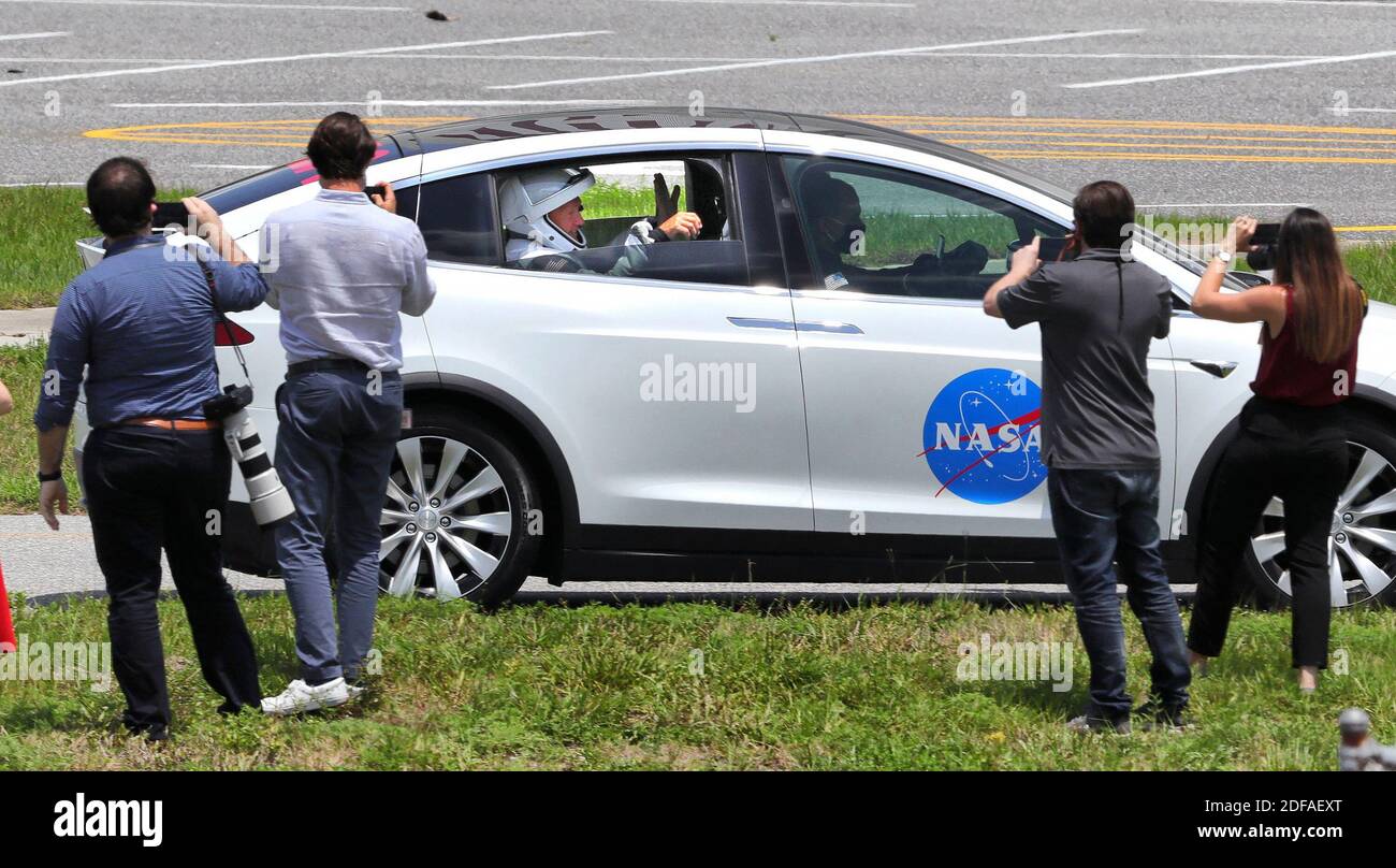 NO FILM, NO VIDEO, NO TV, NO DOCUMENTARY - SpaceX Crew Dragon astronauts Doug Hurley and Bob Behnken wave to supporters as they are driven to the launch complex at Kennedy Space Center, Fla., ahead of launch on Saturday, May 30, 2020. The SpaceX Demo-2 mission is the first crewed launch of an orbital spaceflight from the U.S. in nearly a decade. Photo by Joe Burbank/Orlando Sentinel/TNS/ABACAPRESS.COM Stock Photo