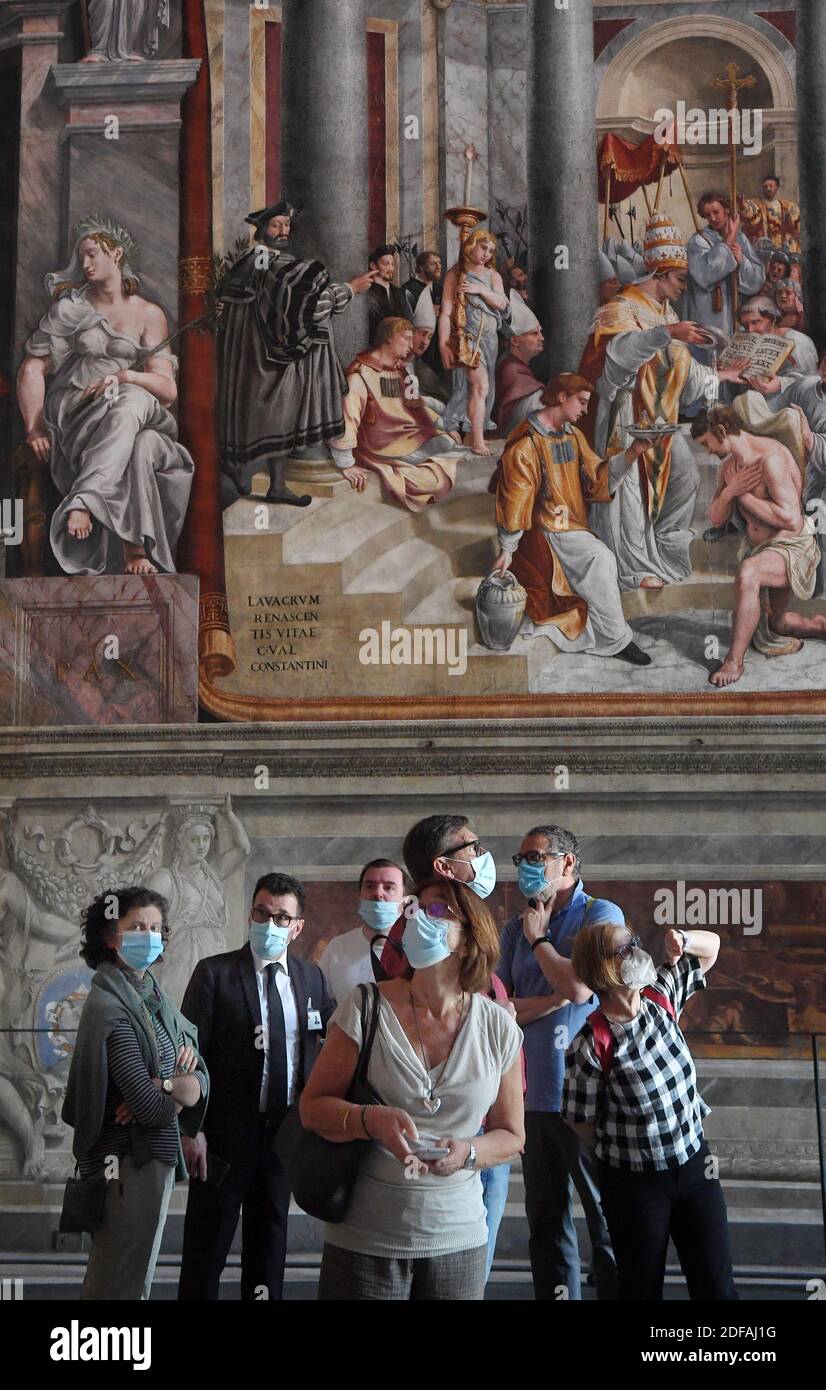Vatican Mask Only a few people wearing protective mask visit the Room of Constantine ...