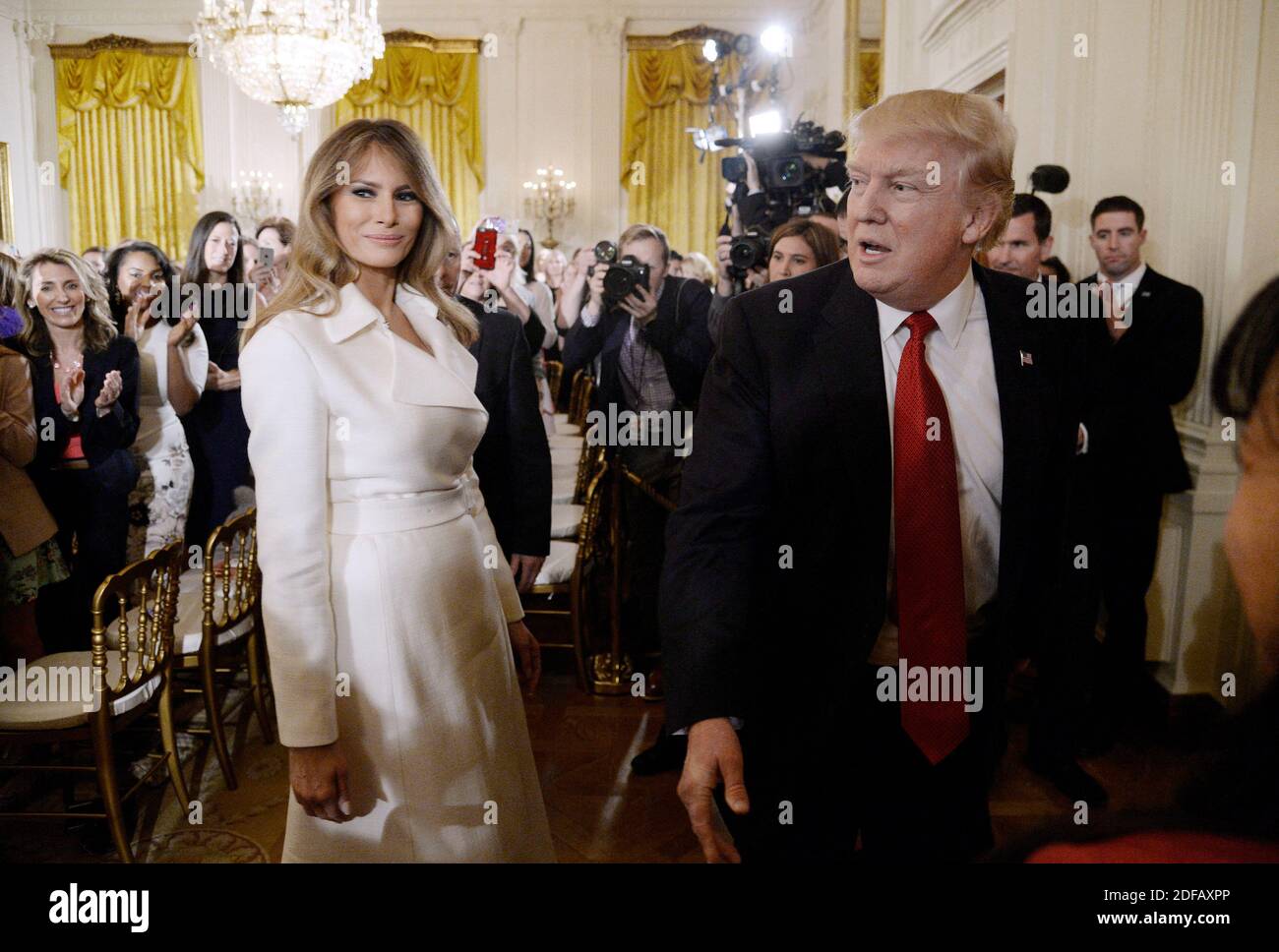 File photo - First Lady Melania Trump and President Donald Trump attend the WomenâÂ€Â™s Empowerment Panel at the White House in Washington, DC, March 29, 2017.A new, scrupulously reported biography by Washington Post reporter Mary Jordan argues that the first lady is not a pawn but a player, an accessory in the second as much as the first sense, and a woman able to get what she wants from one of the most powerful and transparently vain men in the world. The book is called The Art of Her Deal. Photo by Olivier Douliery/ Abaca Stock Photo