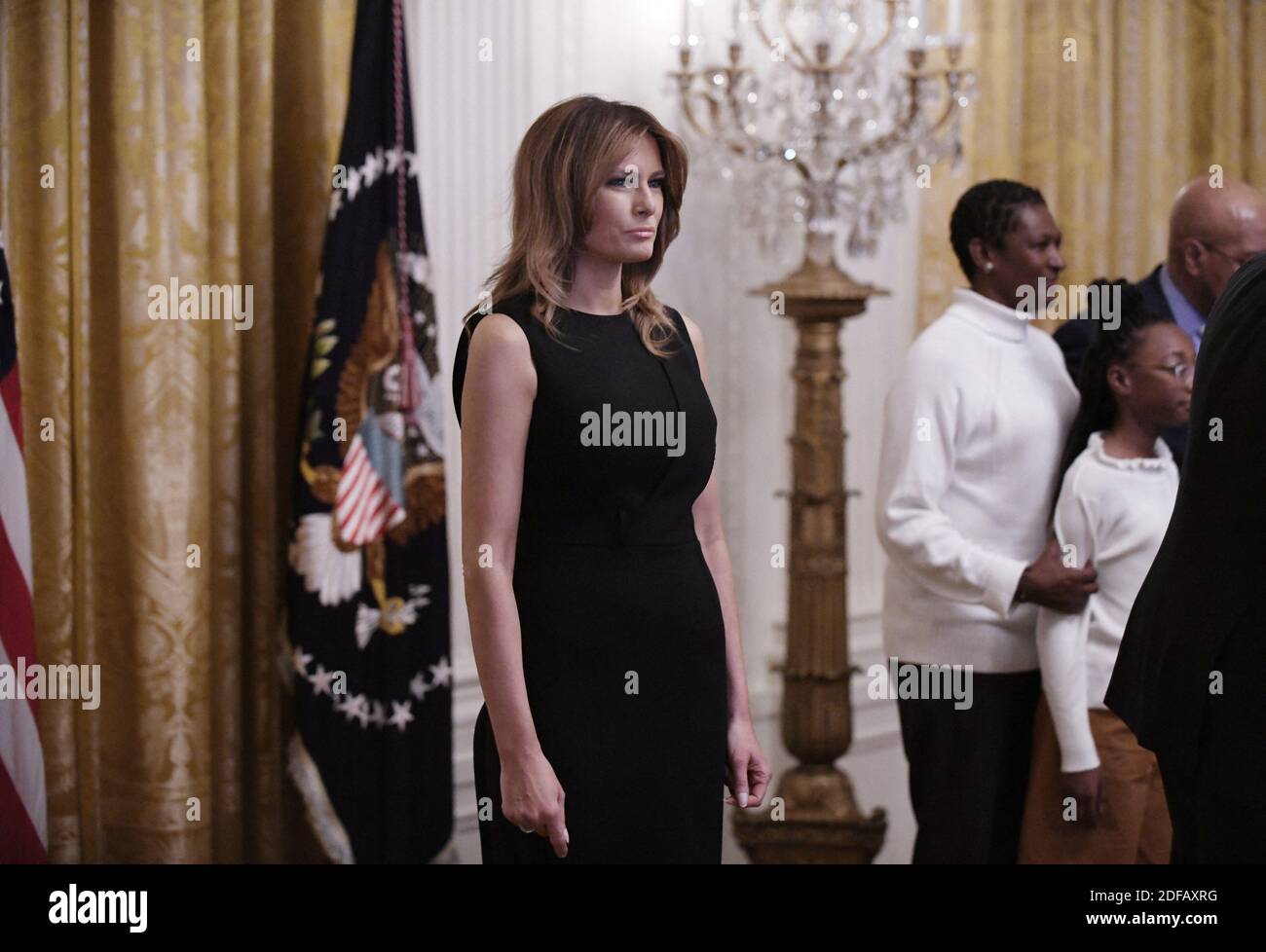 File photo - First lady Melania Trump looks on during a reception for National African American History Month, on February 21, 2019, in Washington, DC. A new, scrupulously reported biography by Washington Post reporter Mary Jordan argues that the first lady is not a pawn but a player, an accessory in the second as much as the first sense, and a woman able to get what she wants from one of the most powerful and transparently vain men in the world. The book is called The Art of Her Deal. Photo by Olivier Douliery/ABACAPRESS.COM Stock Photo