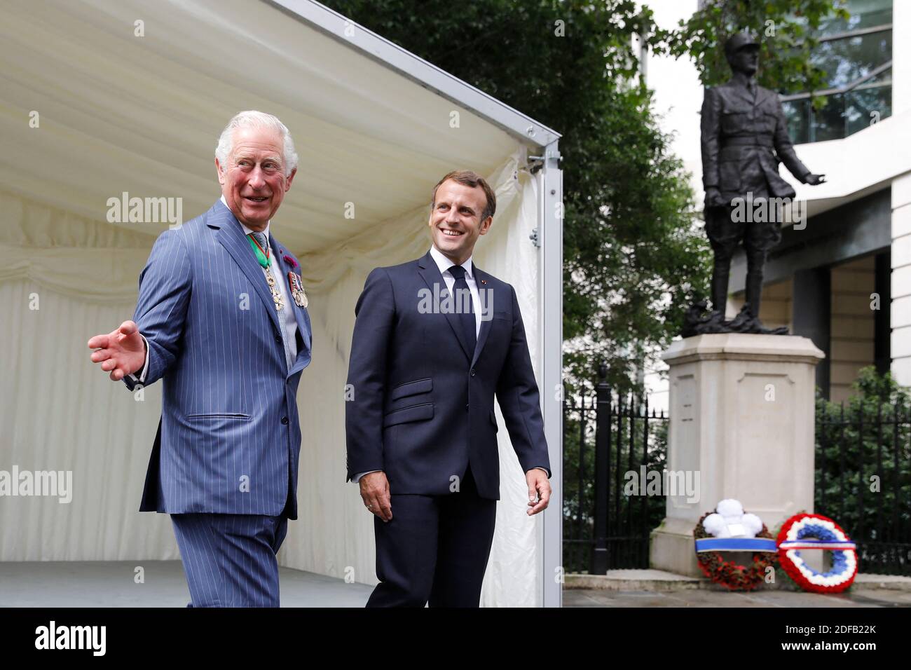 Britain's Prince Charles, Prince of Wales (L) and French President Emmanuel Macron (R) leave after a ceremony to lay wreaths at the statue of former French president Charles de Gaulle at Carlton Gardens in central London on June 18, 2020 during a visit to mark the anniversary of former de Gaulle's appeal to French people to resist the Nazi occupation. - Macron visited London on June 18 to commemorate the 80th anniversary of former French president Charles de Gaulle's appeal to French people to resist the Nazi occupation during World War II. Photo by Tolga AKMEN/Pool/ABACAPRESS.COM Stock Photo