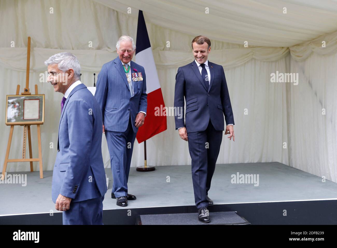 Britain's Prince Charles, Prince of Wales (C) and French President Emmanuel Macron (R) leave after a ceremony to lay wreaths at the statue of former French president Charles de Gaulle at Carlton Gardens in central London on June 18, 2020 during a visit to mark the anniversary of former de Gaulle's appeal to French people to resist the Nazi occupation. - Macron visited London on June 18 to commemorate the 80th anniversary of former French president Charles de Gaulle's appeal to French people to resist the Nazi occupation during World War II. Photo by Tolga AKMEN/Pool/ABACAPRESS.COM Stock Photo