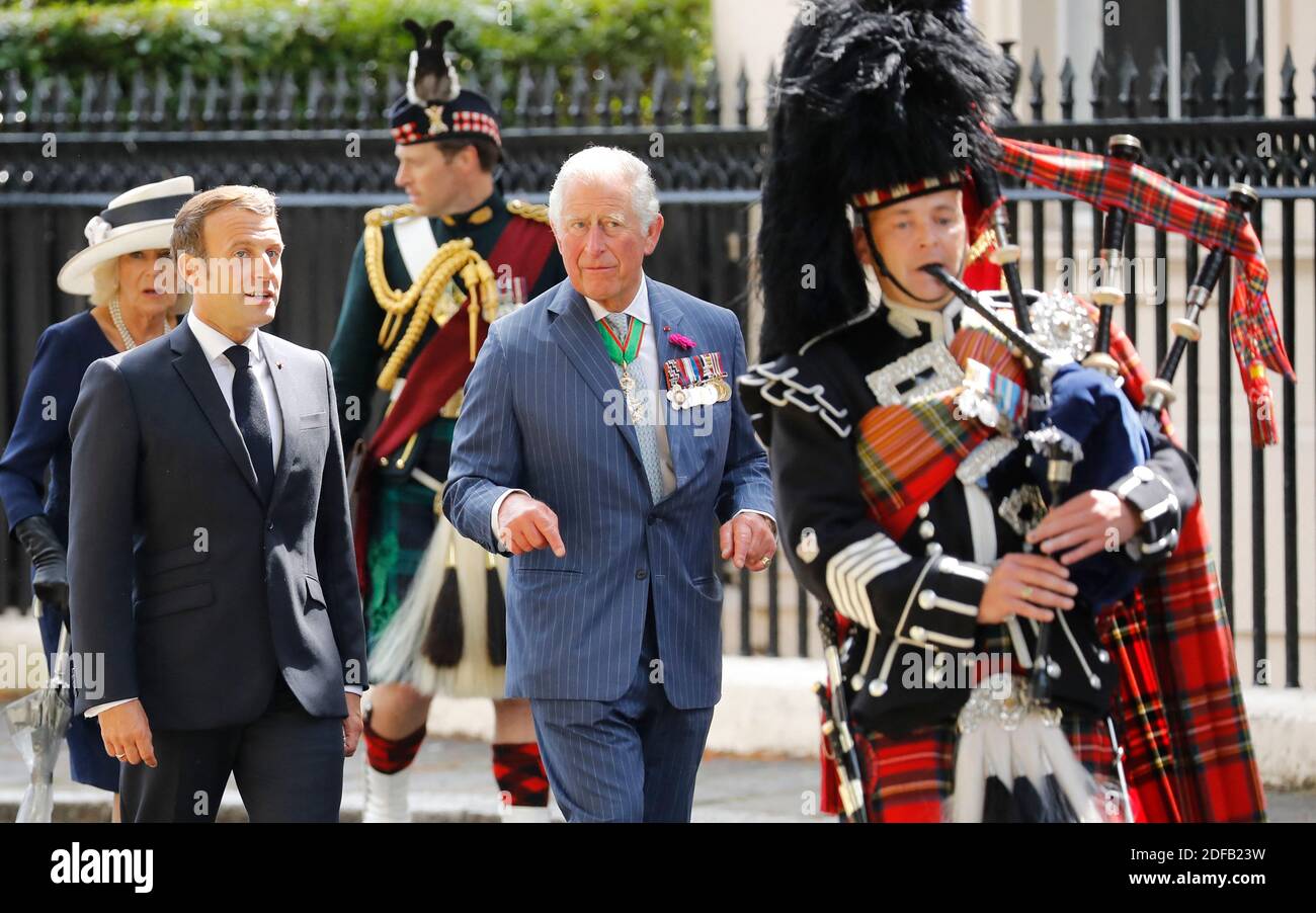 Britain's Camilla, Duchess of Cornwall (L), Britain's Prince Charles, Prince of Wales (C) and French President Emmanuel Macron (2nd L) arrive to lay wreaths at the statue of former French president Charles de Gaulle at Carlton Gardens in central London on June 18, 2020 during a visit to mark the anniversary of former de Gaulle's appeal to French people to resist the Nazi occupation. - Macron visited London on June 18 to commemorate the 80th anniversary of former French president Charles de Gaulle's appeal to French people to resist the Nazi occupation during World War II. Photo by Tolga AKMEN/ Stock Photo