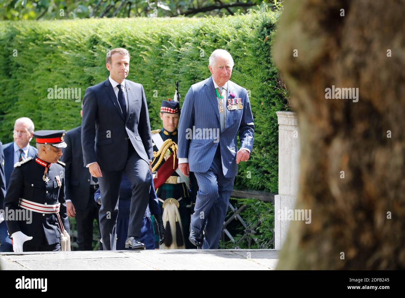 Britain's Prince Charles, Prince of Wales (R) and French President Emmanuel Macron (L) arrive to lay wreaths at the statue of former French president Charles de Gaulle at Carlton Gardens in central London on June 18, 2020 during a visit to mark the anniversary of former de Gaulle's appeal to French people to resist the Nazi occupation. - Macron visited London on June 18 to commemorate the 80th anniversary of former French president Charles de Gaulle's appeal to French people to resist the Nazi occupation during World War II. Photo by Tolga AKMEN/Pool/ABACAPRESS.COM Stock Photo