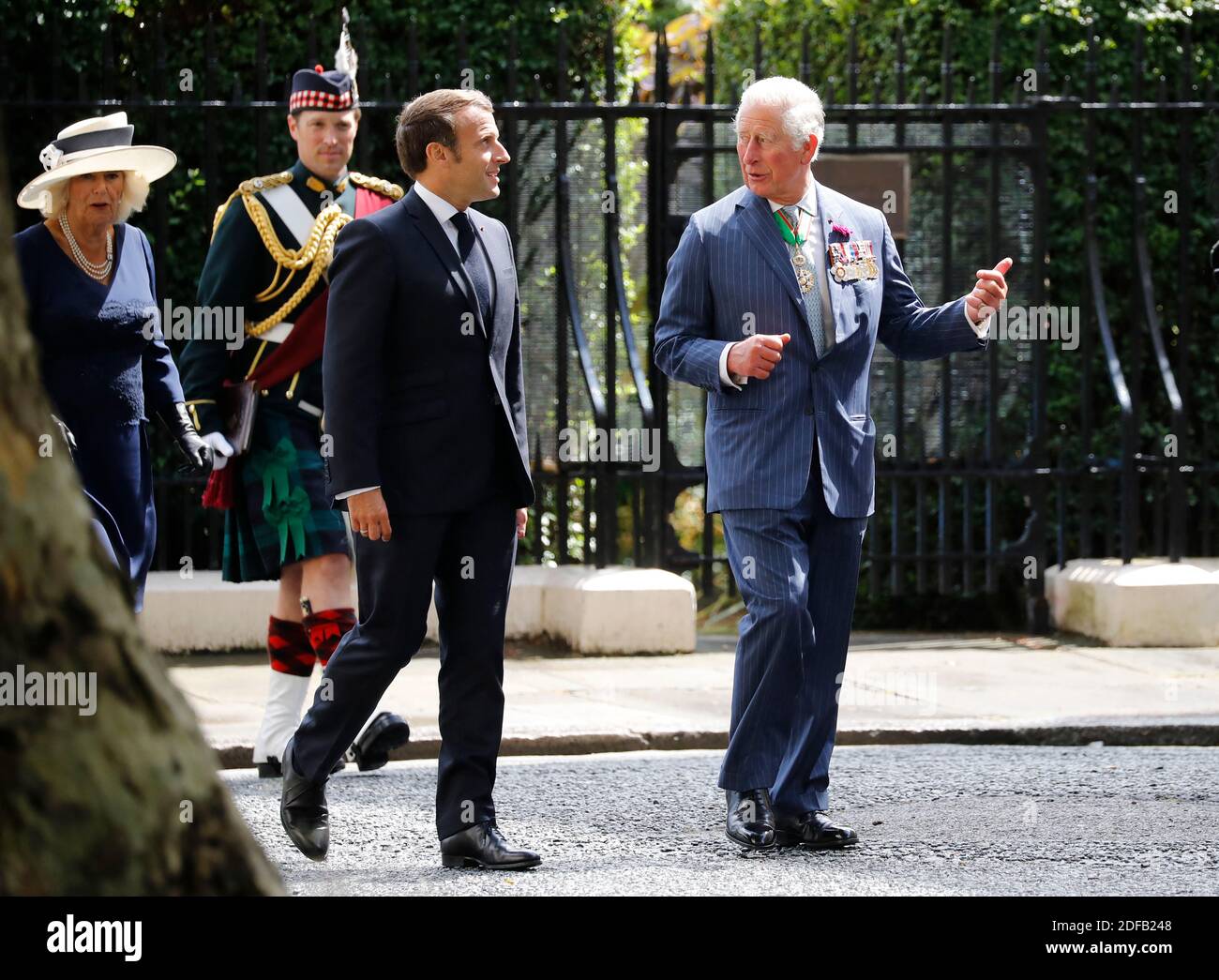 Britain's Prince Charles, Prince of Wales (R) and French President Emmanuel Macron (C) arrive to lay wreaths at the statue of former French president Charles de Gaulle at Carlton Gardens in central London on June 18, 2020 during a visit to mark the anniversary of former de Gaulle's appeal to French people to resist the Nazi occupation. - Macron visited London on June 18 to commemorate the 80th anniversary of former French president Charles de Gaulle's appeal to French people to resist the Nazi occupation during World War II. Photo by Tolga AKMEN/Pool/ABACAPRESS.COM Stock Photo