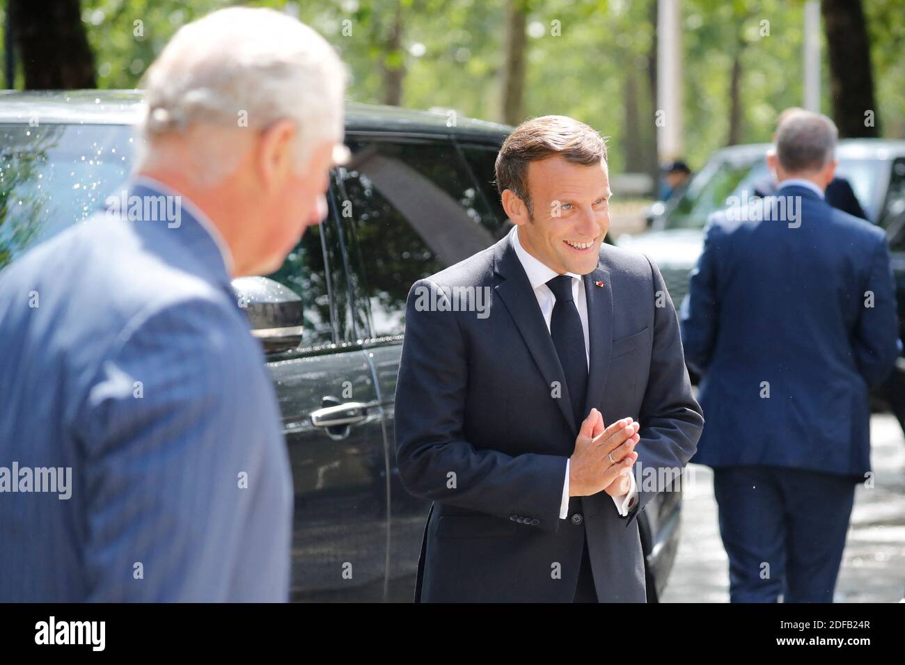 French President Emmanuel Macron gestures as he arrives with Britain's Prince Charles, Prince of Wales (L) to lay a wreath at the statue of former French president Charles de Gaulle at Carlton Gardens in central London on June 18, 2020 to mark the anniversary of former de Gaulle's appeal to French people to resist the Nazi occupation. - Macron visited London on June 18 to commemorate the 80th anniversary of former French president Charles de Gaulle's appeal to French people to resist the Nazi occupation during World War II. Photo by Tolga AKMEN/Pool/ABACAPRESS.COM Stock Photo
