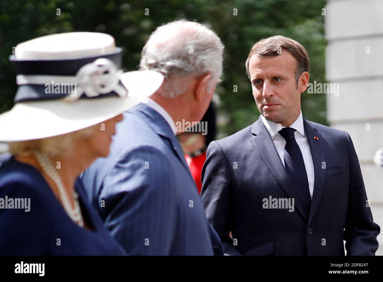 Britain's Prince Charles, Prince of Wales (C) and French President Emmanuel Macron (R) lay wreaths at the statue of former French president Charles de Gaulle at Carlton Gardens in central London on June 18, 2020 during a visit to mark the anniversary of former de Gaulle's appeal to French people to resist the Nazi occupation. - Macron visited London on June 18 to commemorate the 80th anniversary of former French president Charles de Gaulle's appeal to French people to resist the Nazi occupation during World War II. Photo by Tolga AKMEN/Pool/ABACAPRESS.COM Stock Photo