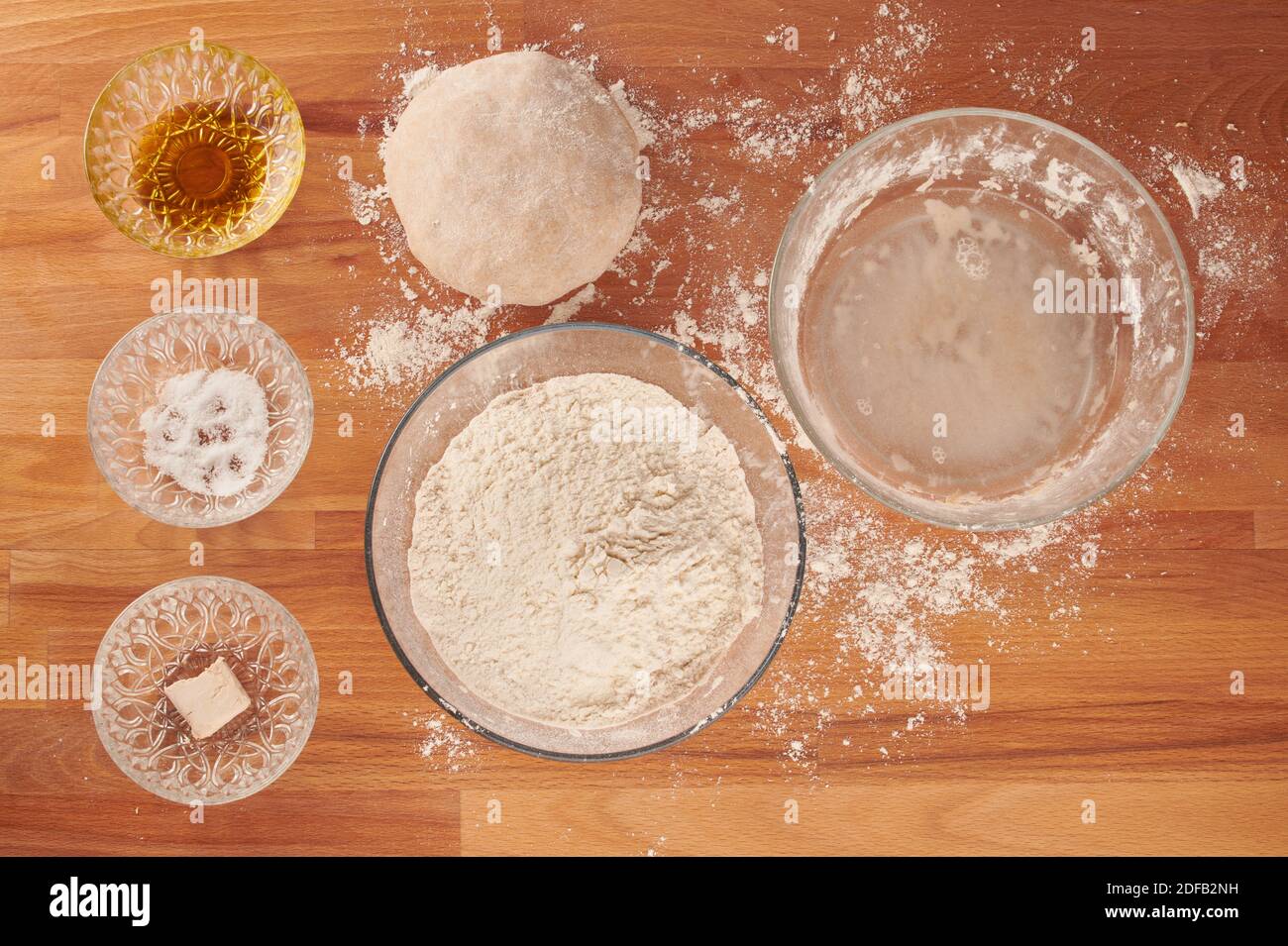 Making italian pizza step by step with ingredients for hand made dough ingredients Stock Photo