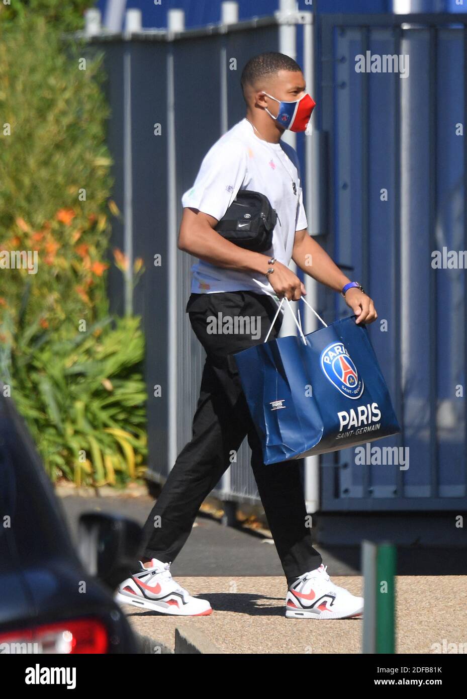 Paris Saint-Germain's Kylian Mbappé arriving at the team's Camp des Loges  training grounds in Saint-Germain-en-Laye, west of Paris, on June 25, 2020.  Photo by Christian Liewig/ Stock Photo - Alamy