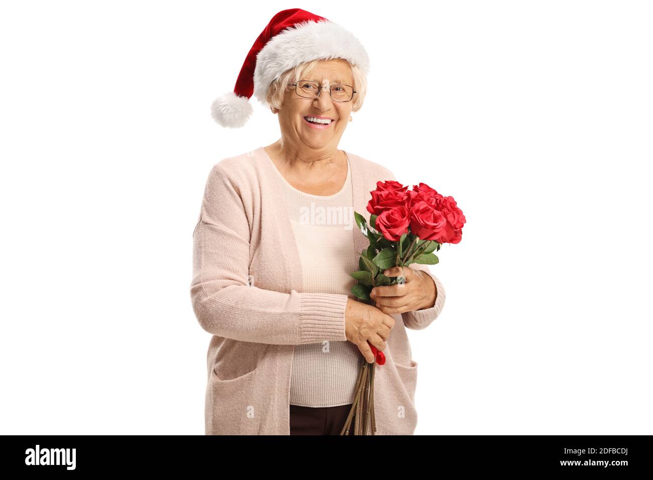 Santa With Roses Elderly woman holding a bouquet of red roses and wearing a santa claus ...