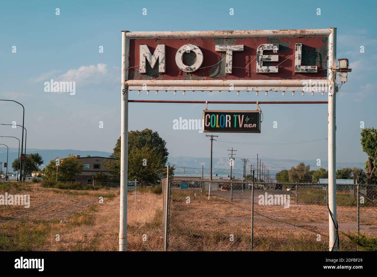 Vernal, Utah - September 20, 2020: Rusty, old motel neon sign, with a vintage color TV by RCA plaque Stock Photo