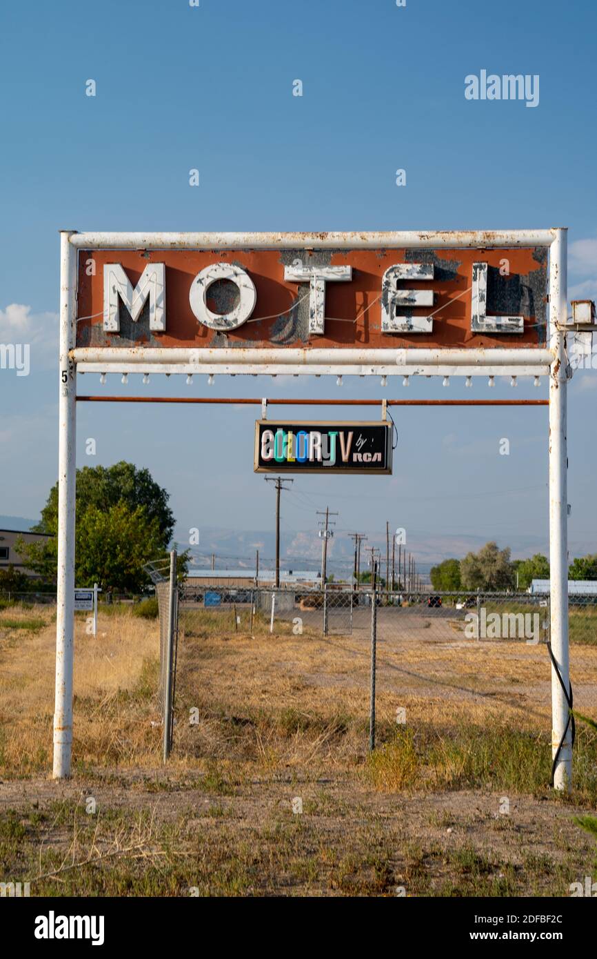 Vernal, Utah - September 20, 2020: Rusty, old motel neon sign, with a vintage color TV by RCA plaque Stock Photo