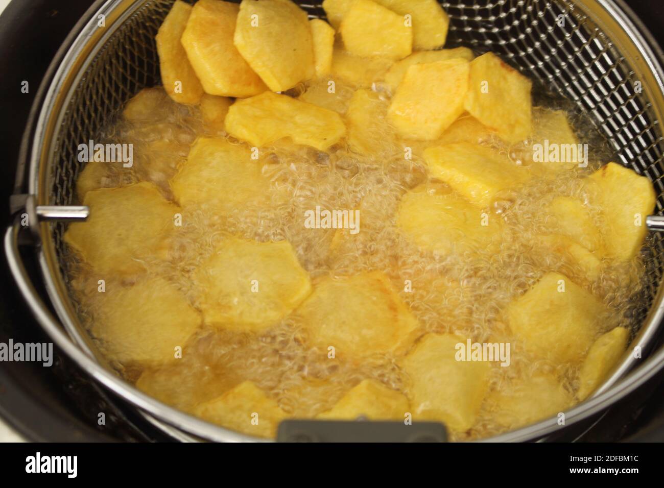fresh crispy french fries from the deep fryer Stock Photo Alamy