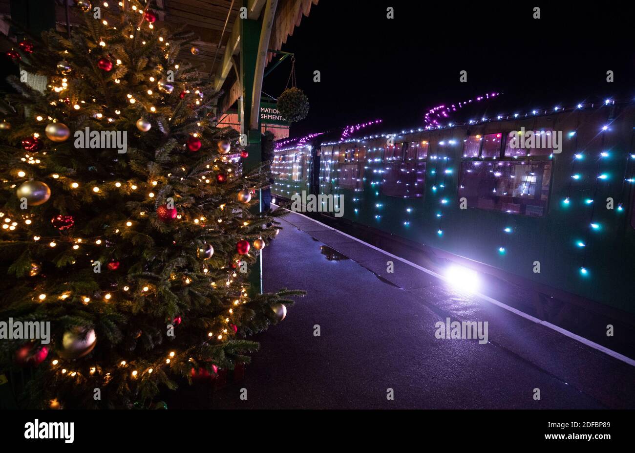 The world's first digital LED train, created using thousands of fully controllable colour mixing LED lights, at Alton station during a preview of Steam Illuminations at Watercress Line, which opens to the public on Friday December 4. Stock Photo