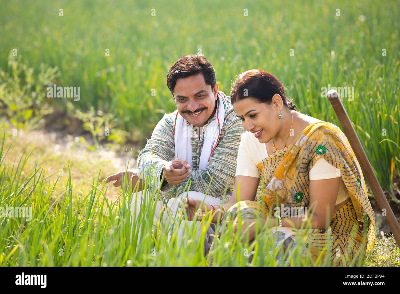 Rural Indian couple in agricultural field Stock Photo - Alamy