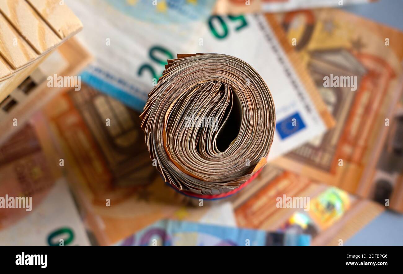 Roll of a euro banknotes of European Union on a money background, face value 10, 20, 50 euros Stock Photo
