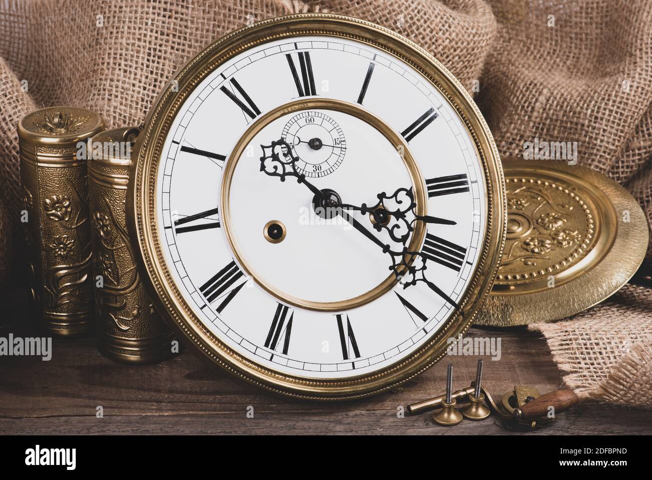 Antique wall clock face with accessories Stock Photo Alamy