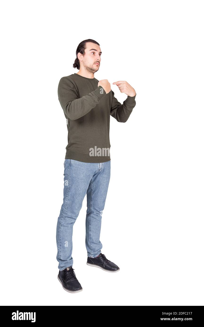 Full length portrait of amazed and perplexed man pointing index fingers to himself, looking confused to camera isolated on white background. Person un Stock Photo