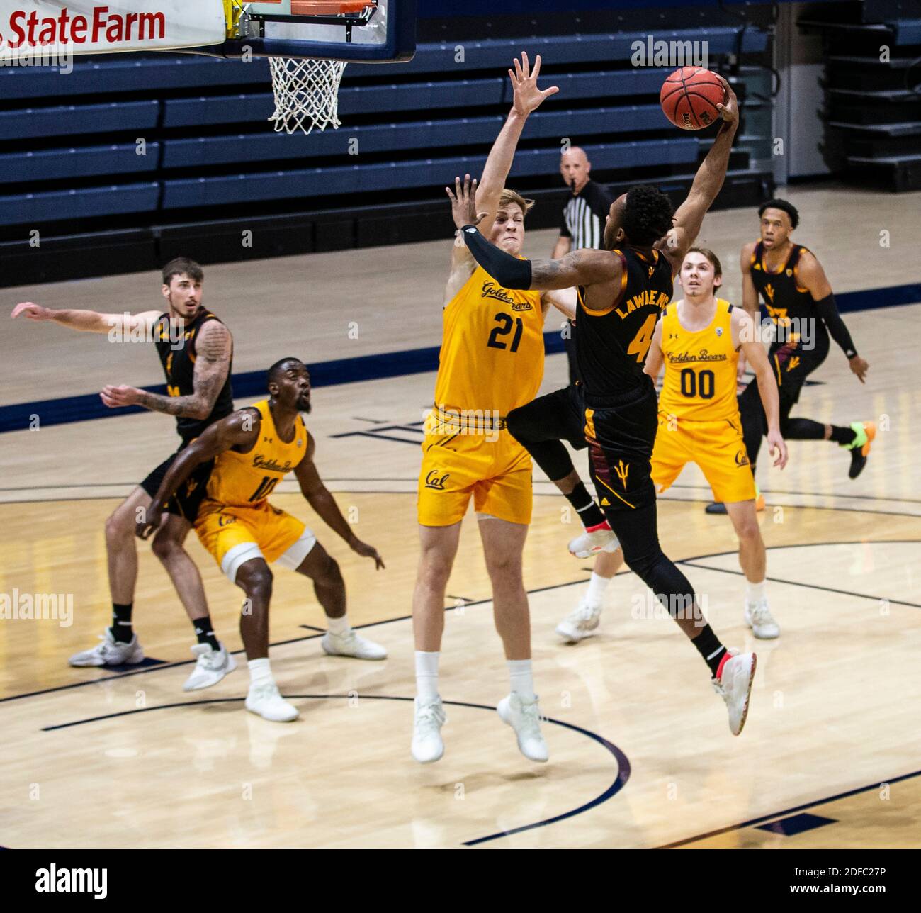 December 03 2020 Berkeley, CA U.S.A. California Golden Bears forward Lars  Thiemann #21 attempts to block the shot of Arizona State forward Kimani  Lawrence #4 during the NCAA Men's Basketball game between