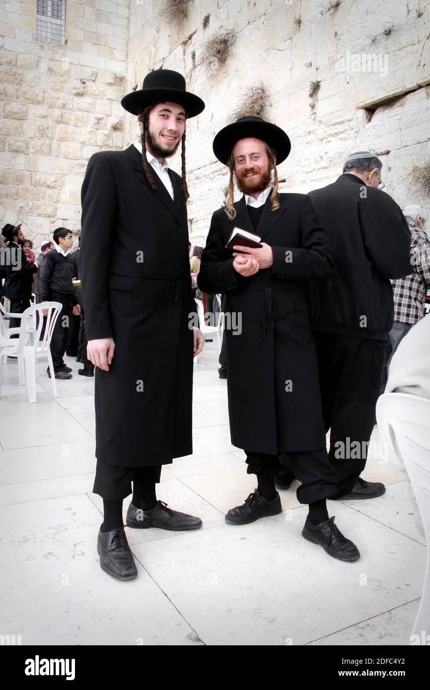 Israel, Jerusalem, Wailing Wall, ultra Orthodow Jews smile at the Western Wall, two Haredim Stock Photo