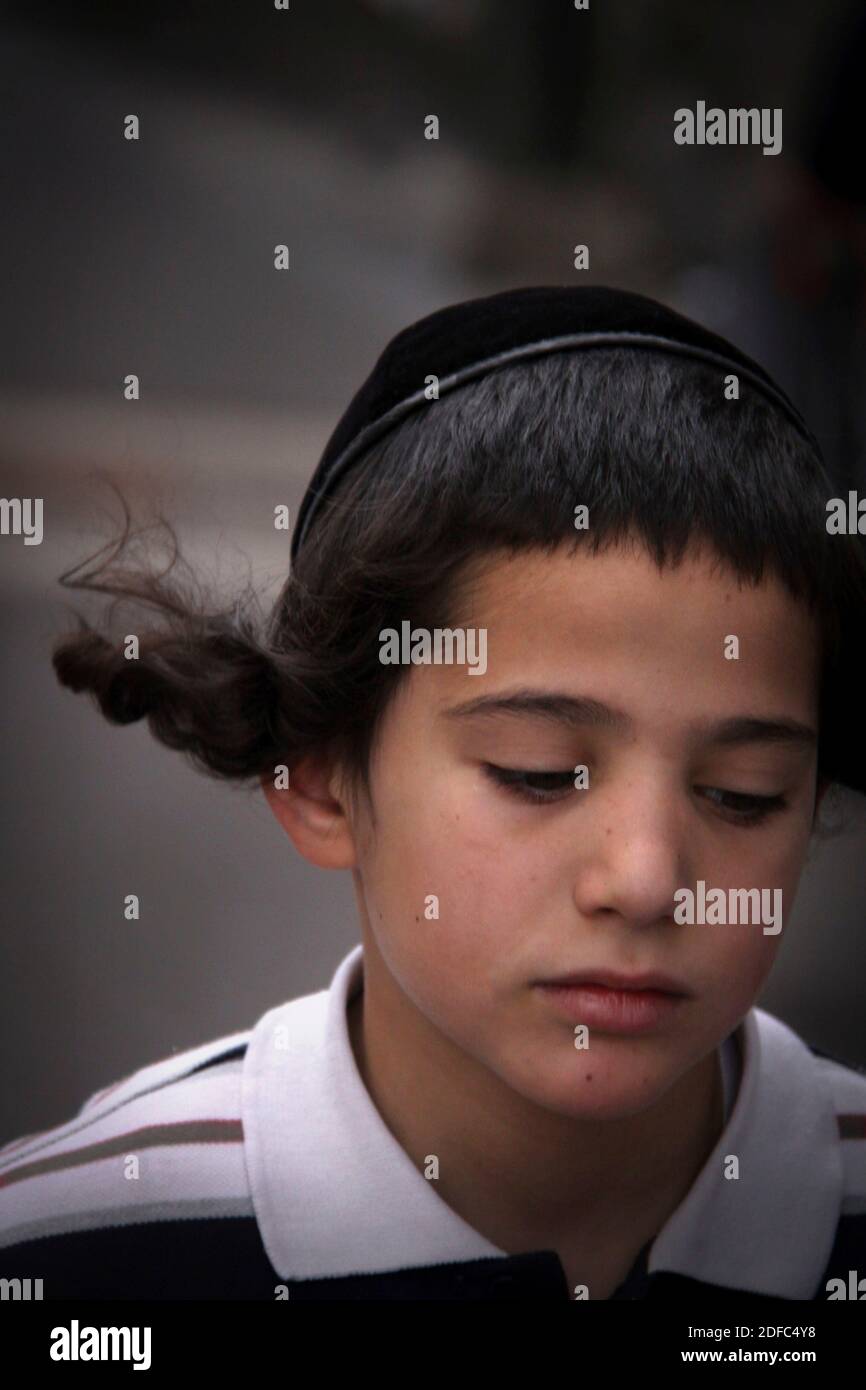 Israel, ultra-Orthodox Jewish child wearing the kippah in the Mea Shearim neighborhood in Jerusalem Stock Photo