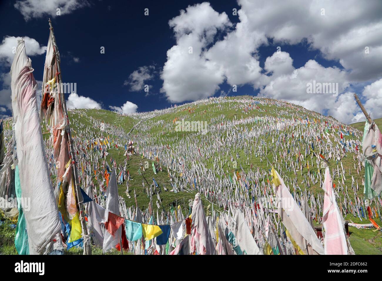 China, Sichuan, Ani gompa, prayer flags near a sky burial site Stock Photo