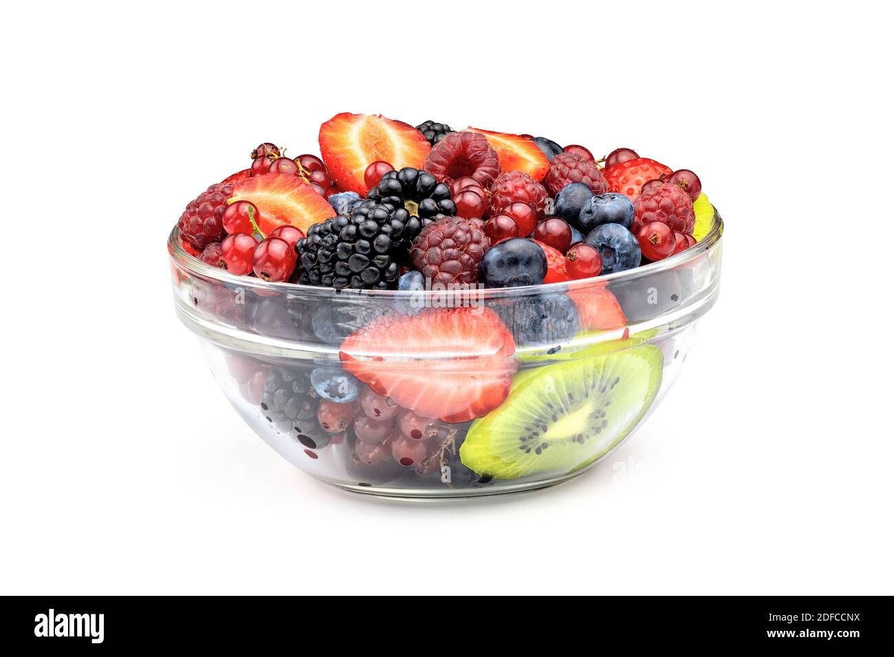 Fruit salad in glass bowl isolated on white background Stock Photo - Alamy