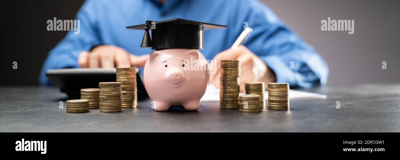 College Piggy Bank With Graduation Hat. Education Piggybank Stock Photo