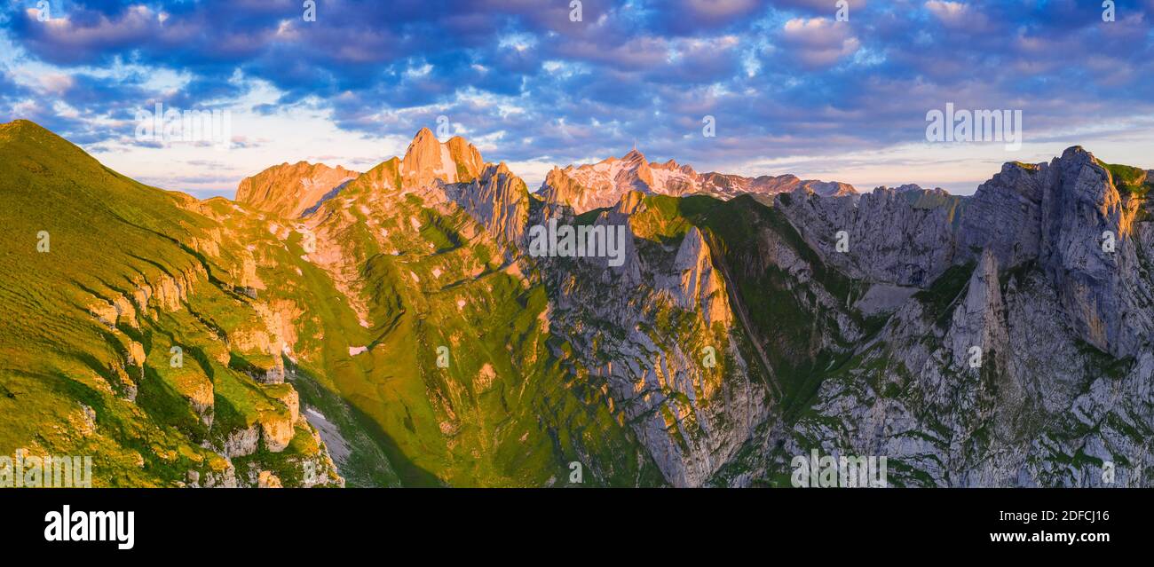 Aerial view of Santis mountain peak lit by sunrise, Appenzell Canton, Alpstein Range, Switzerland Stock Photo