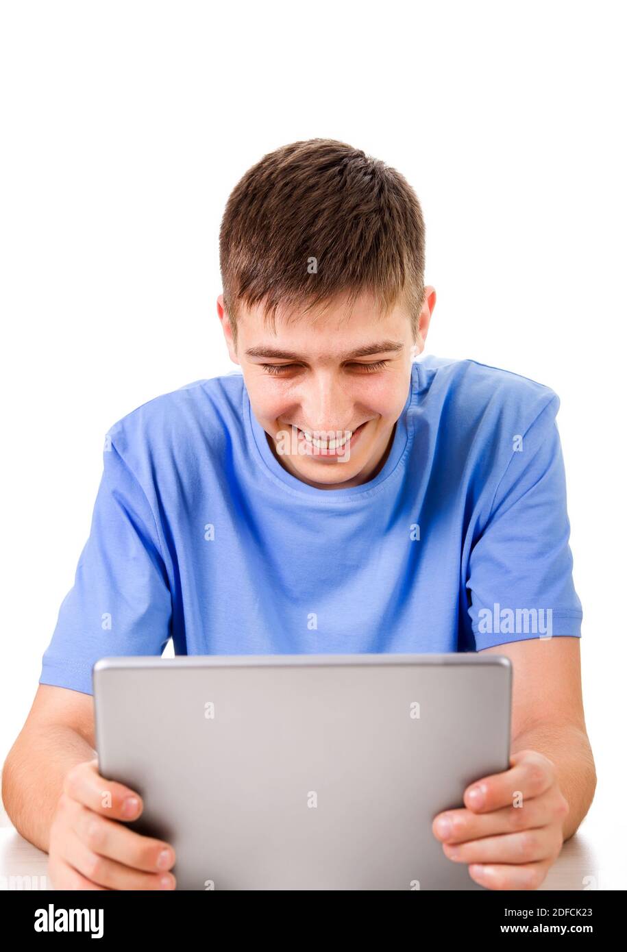 Cheerful Young Man with Tablet Computer Isolated on the White Background Stock Photo