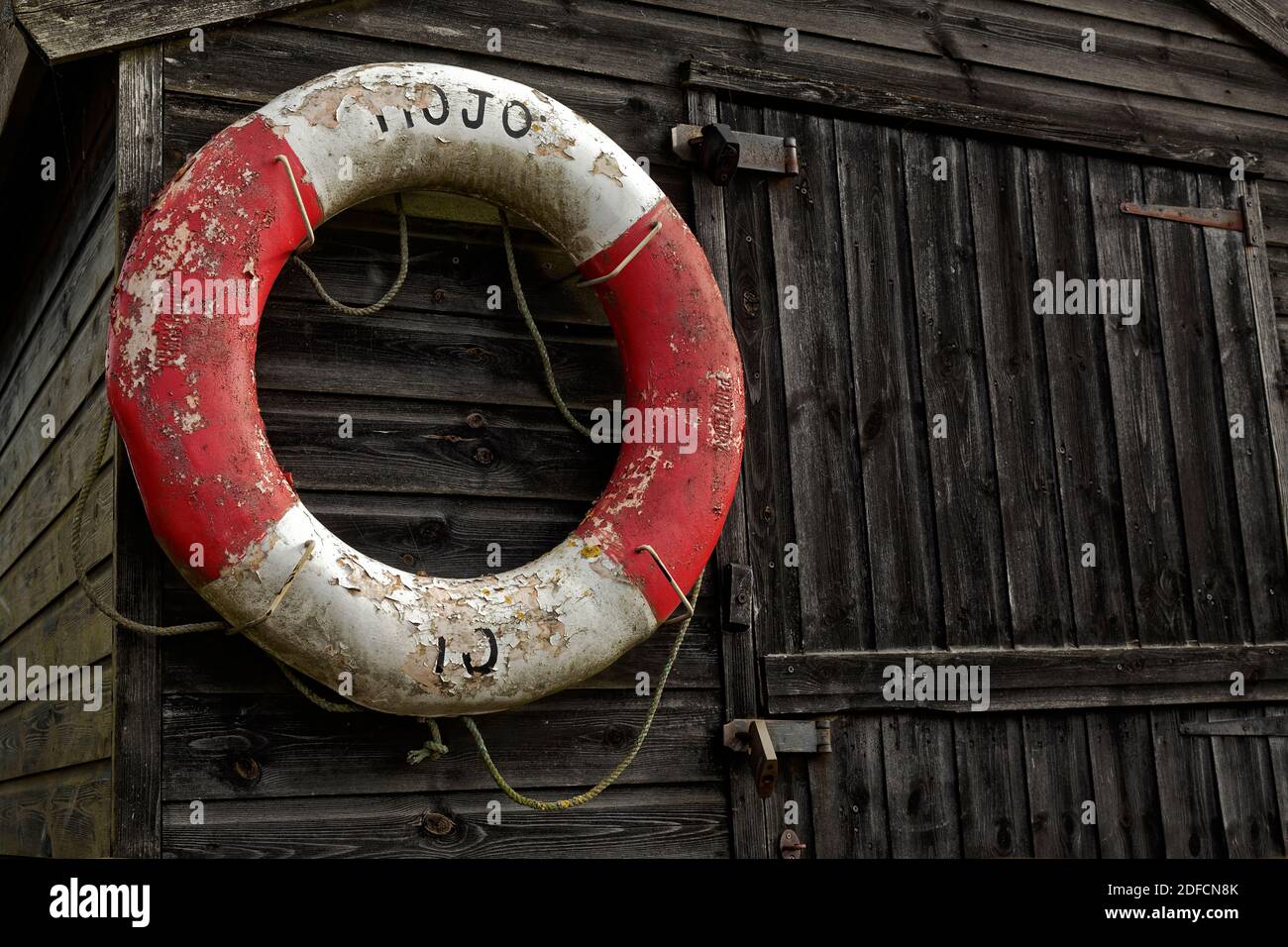 Old life ring on a Fisherman's shed Stock Photo