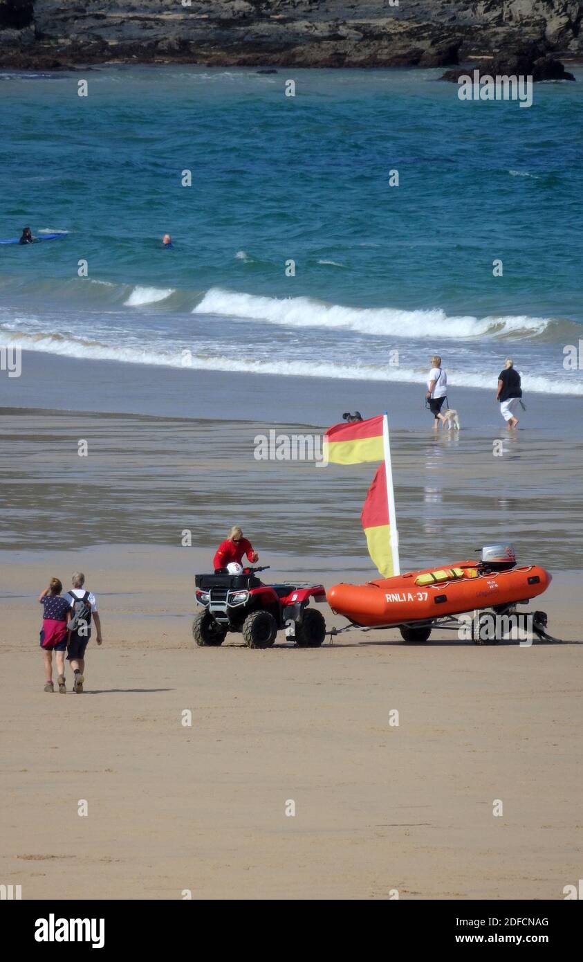 RNLI Quad Bike and Dinghy On A Trailer, Harlyn Bay Beach, North Cornwall, England, UK in September Stock Photo