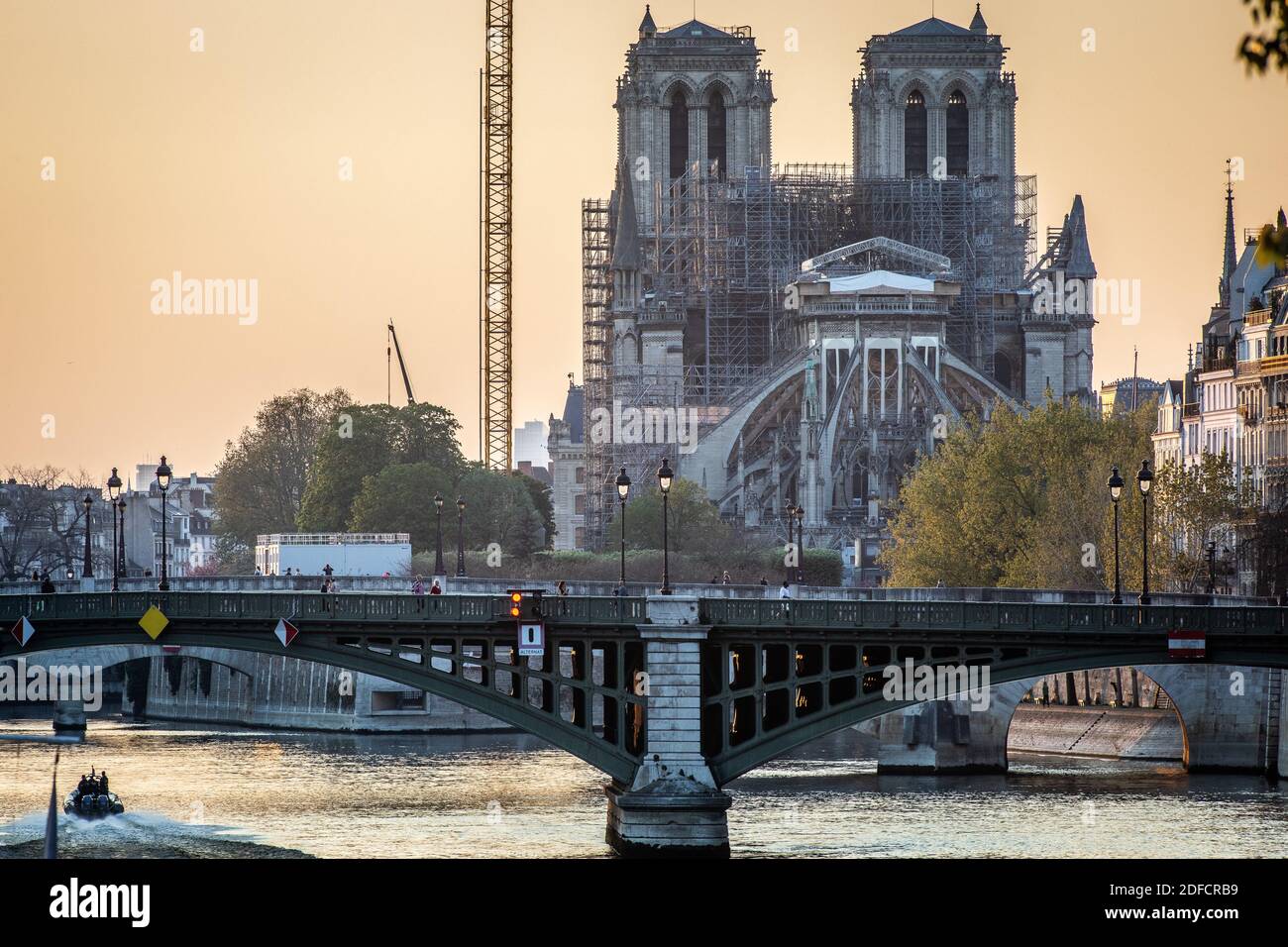 1 YEAR AFTER THE FIRE, THE NOTRE DAME DE PARIS CATHEDRAL RECONSTRUCTION SITE SHUT DOWN DURING THE COVID-19 PANDEMIC LOCKDOWN, PARIS, ILE DE FRANCE Stock Photo