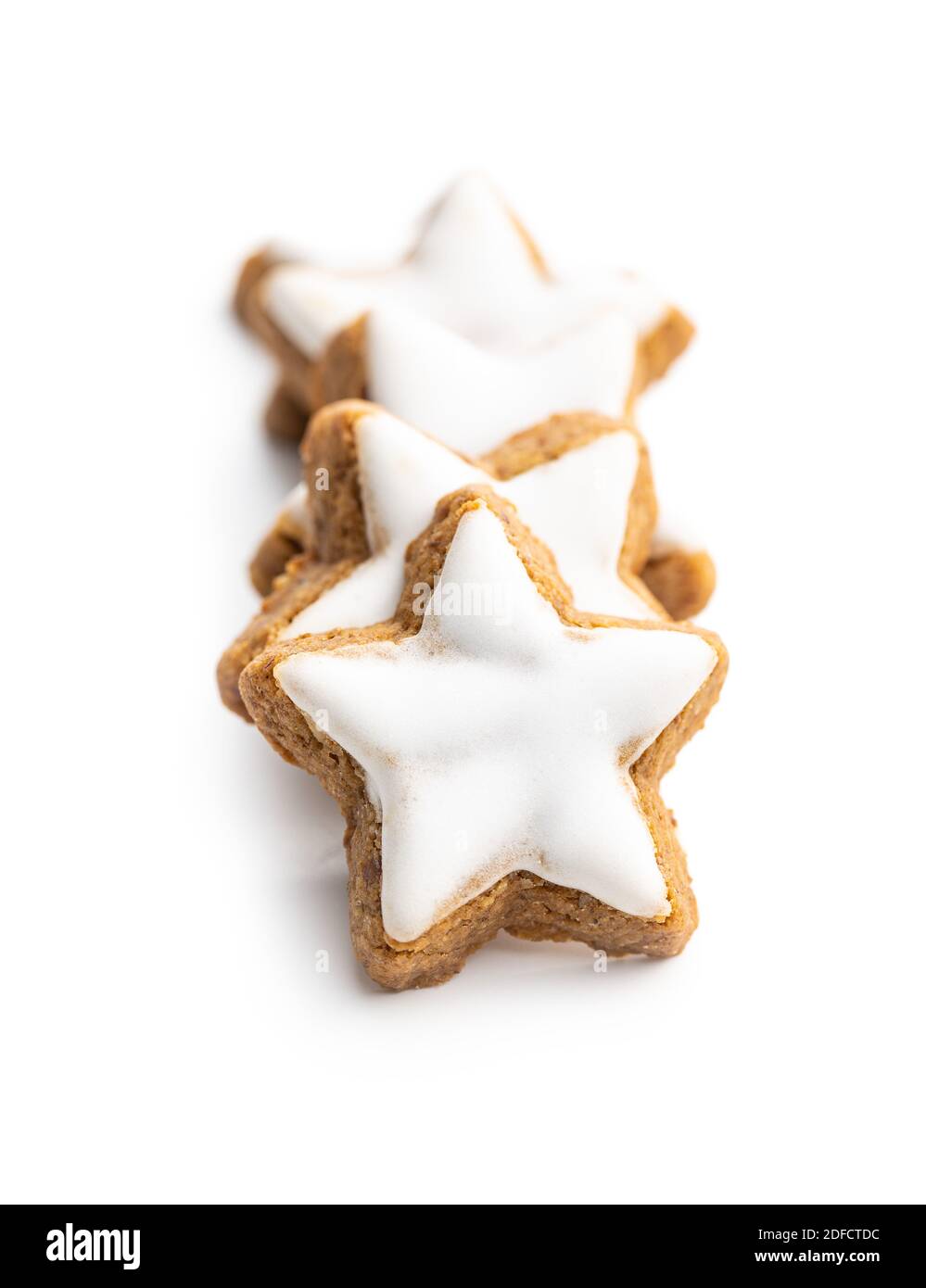 Icing gingerbread stars. Traditional Christmas cookies isolated on ...