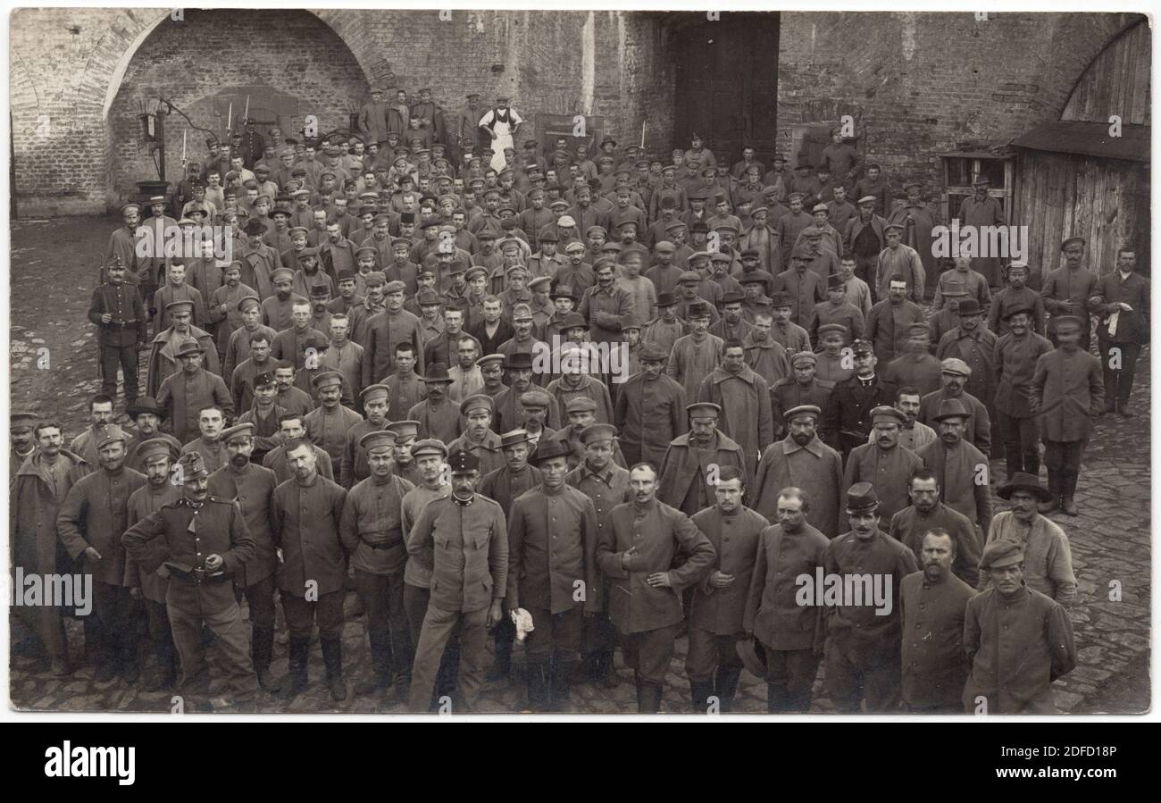 Russian prisoners of war pictured during the First World War probably in the Austro-Hungarian POW Camp Josefstadt (now Josefov near Jaroměř in Central Bohemia, Czech Republic) depicted in the black and white vintage photograph by an unknown photographer dated from 1915 to 1918. Courtesy of the Azoor Photo Collection. Stock Photo
