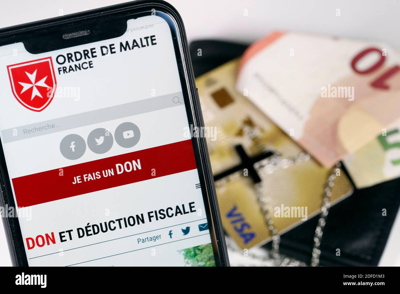 Fundraising on a smartphone for ordre de malte Stock Photo