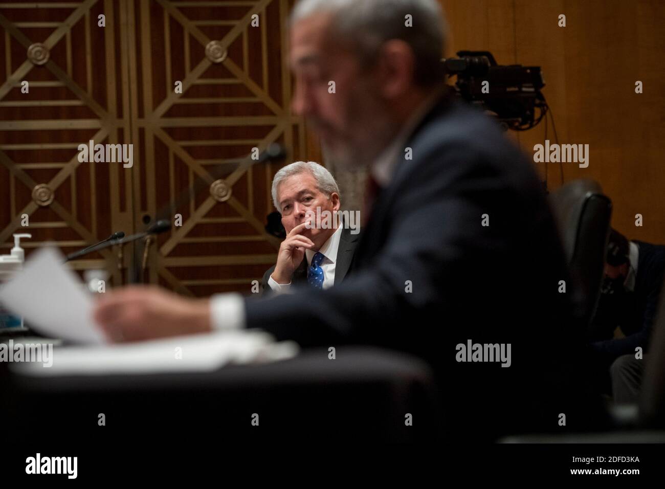 Former Assistant Director for Intelligence Federal Bureau of Investigation Kevin R. Brock, left, and Investigative Journalist & Author Lee Smith, right, appear before a Senate Committee on Homeland Security and Governmental Affairs hearing to examine Congressional oversight in the face of Executive Branch and media suppression, focusing on the case study of Crossfire Hurricane, in the Dirksen Senate Office Building in Washington, DC., Thursday, December 3, 2020. Credit: Rod Lamkey/CNP /MediaPunch Stock Photo