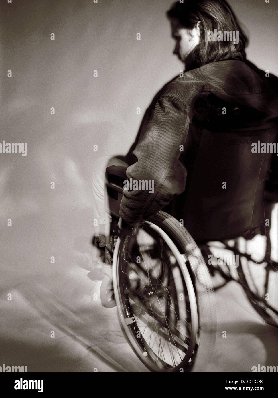 Young man in a wheelchair Stock Photo