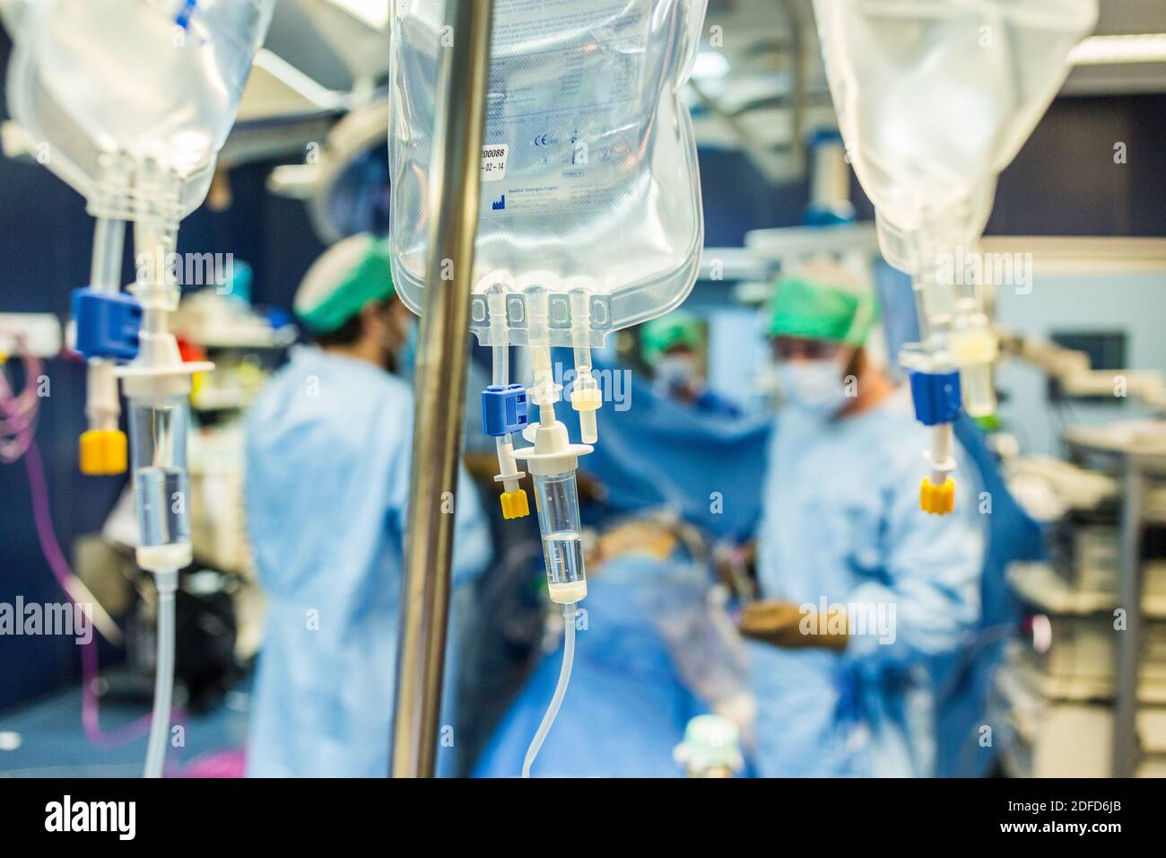 Sodium chloride bags in an operating theater, France. Stock Photo