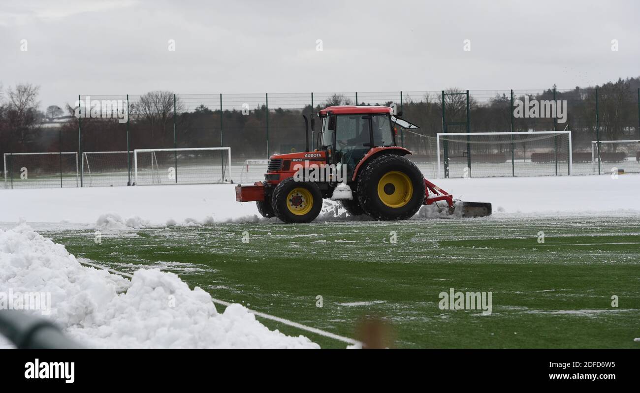 Tranent, Ormiston, East Lothian.Scotland. UK 4th Dec 20 Hibernian ground staff snow clearing at their training HQ before Squad training session for Scottish Premiership match with Motherwell. Credit: eric mccowat/Alamy Live News Stock Photo