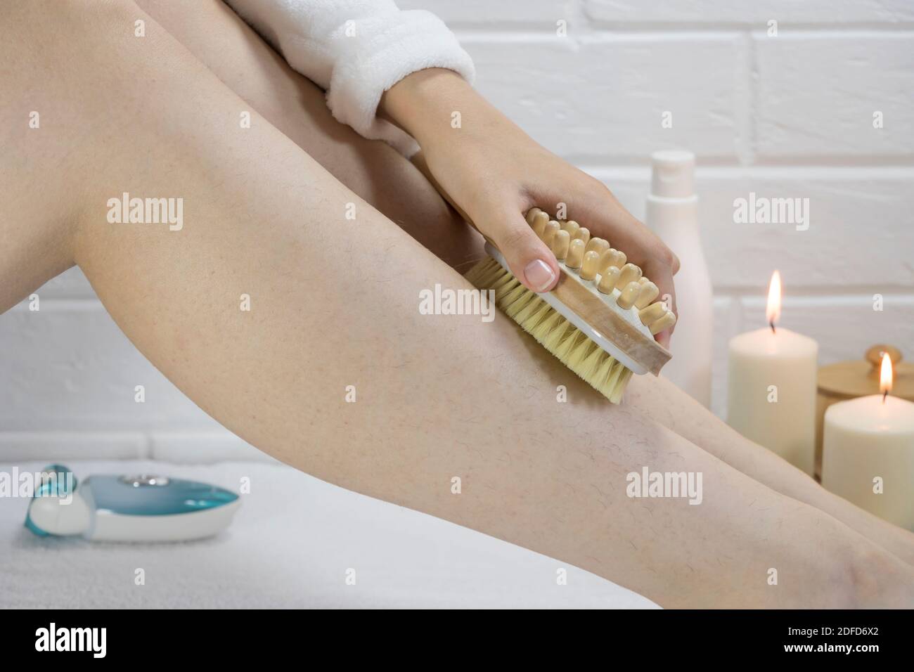 Exfoliation with a natural bristle brush. Dry brush massage. Preparing