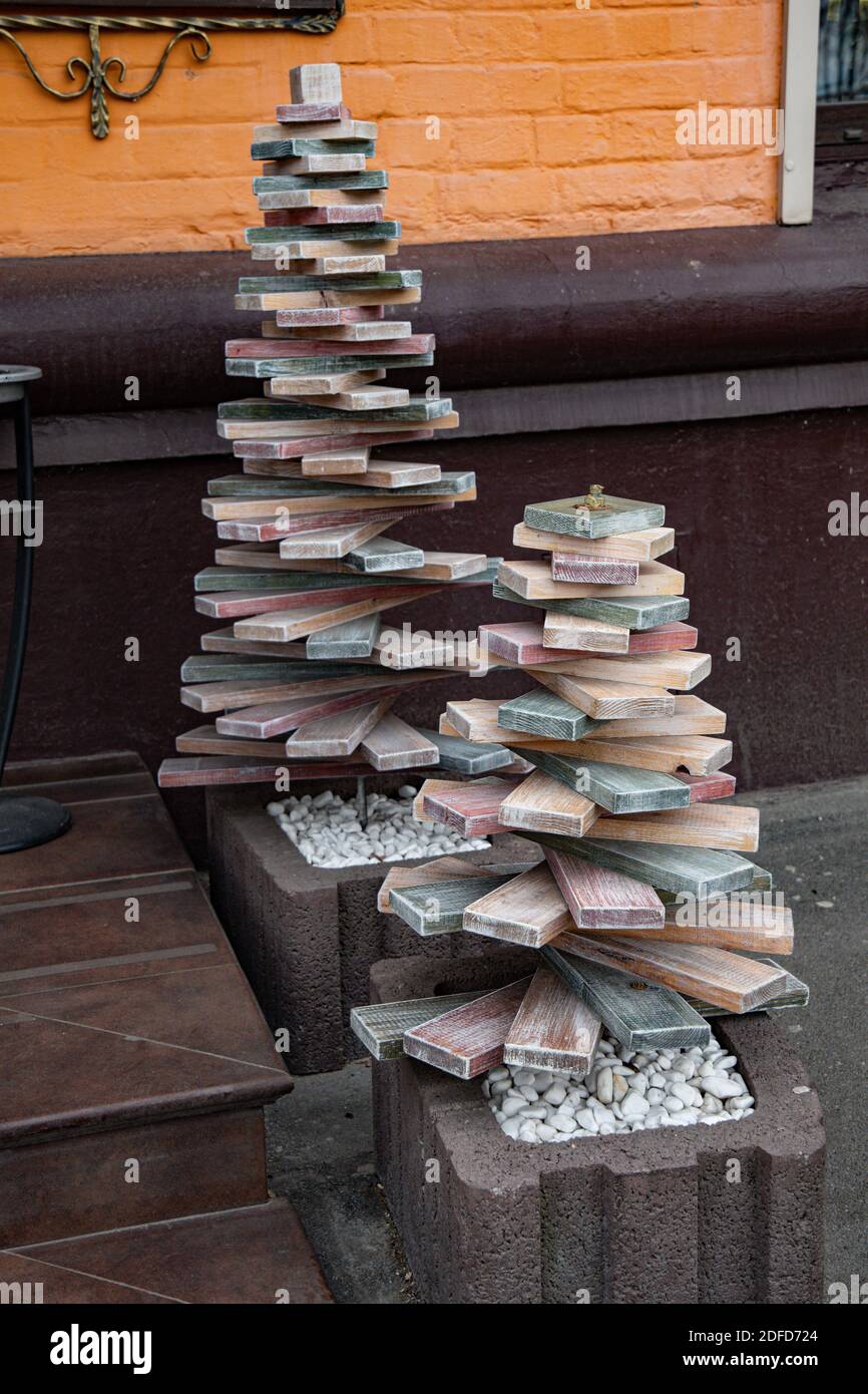 Eco friendly Christmas trees of pyramid shape made from recycled