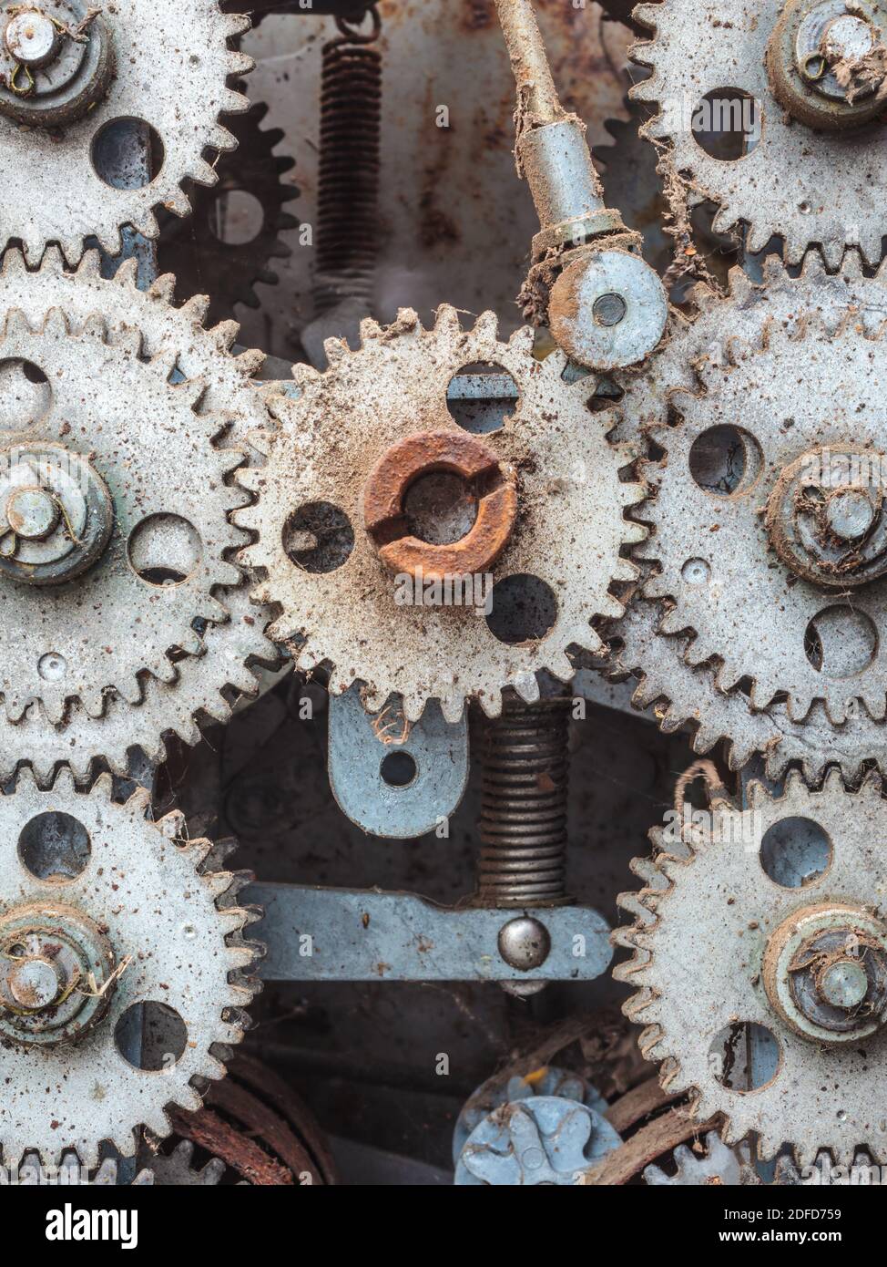 Old dirty weathered cogwheels of an industrial machine Stock Photo