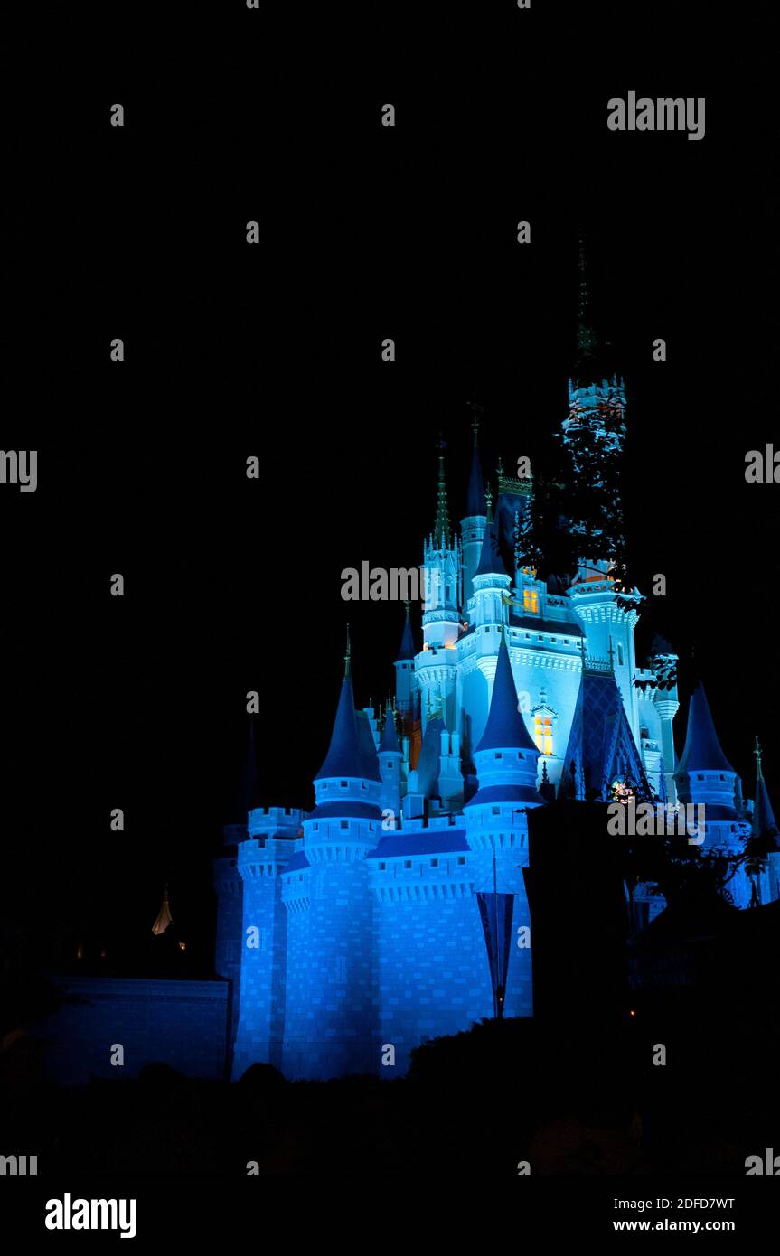 Colorful Fireworks at night around the famous castle Magic Kingdom, icon of multiple Hollywood movies. Disneyworld Florida, FL US USA Stock Photo