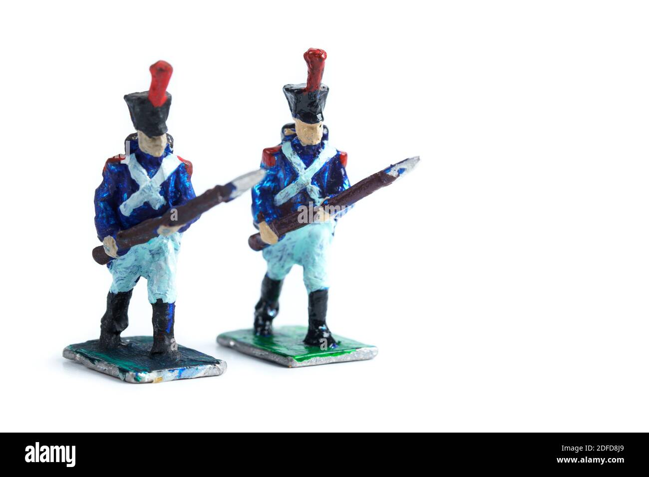 Photo of handmade vintage tin soldiers on the white background Stock Photo