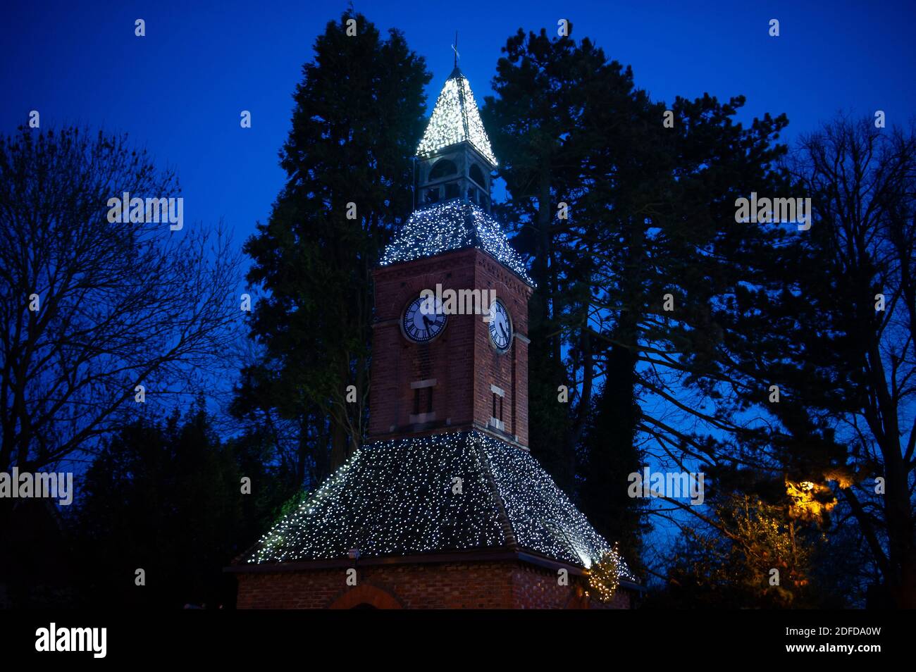 Wendover, Buckinghamshire, UK. 1st December, 2020. The Clock Tower in Wendover sparkles with Christmas lights. Local shops and pubs in Wendover are hoping for a busy December as they reopen after the second Covid-19 lockdown ends and the town goes into Tier 2. Credit: Maureen McLean/Alamy Stock Photo